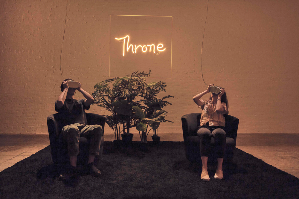 Throne, 2019 LED, Plexiglas, silicone, velvet chairs, plastic plants and HD virtual reality color video with sound.